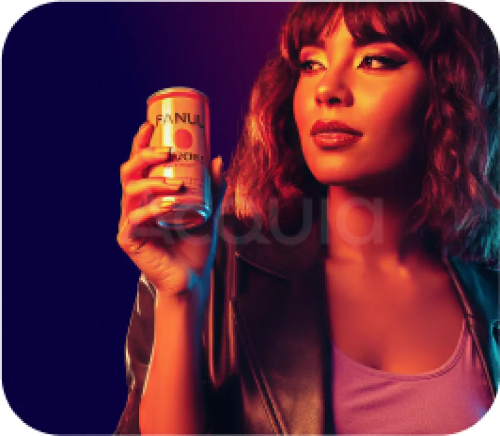 Person with reddish hair holding a drink in dramatic blue and purple lighting.